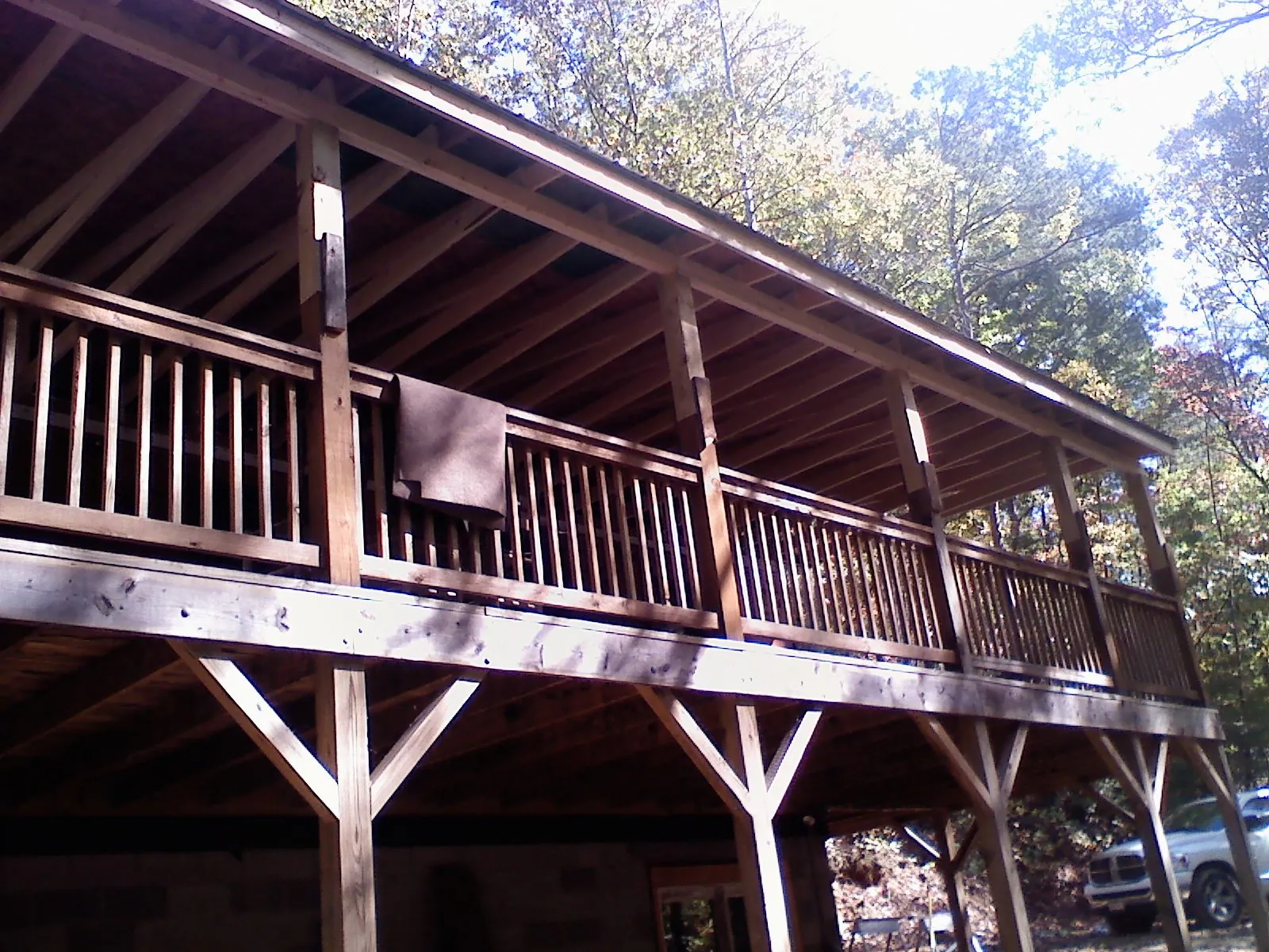 Timber framing under a new elevated porch and deck — Roof Leak Repair in Sherburne by Roofing Brothers